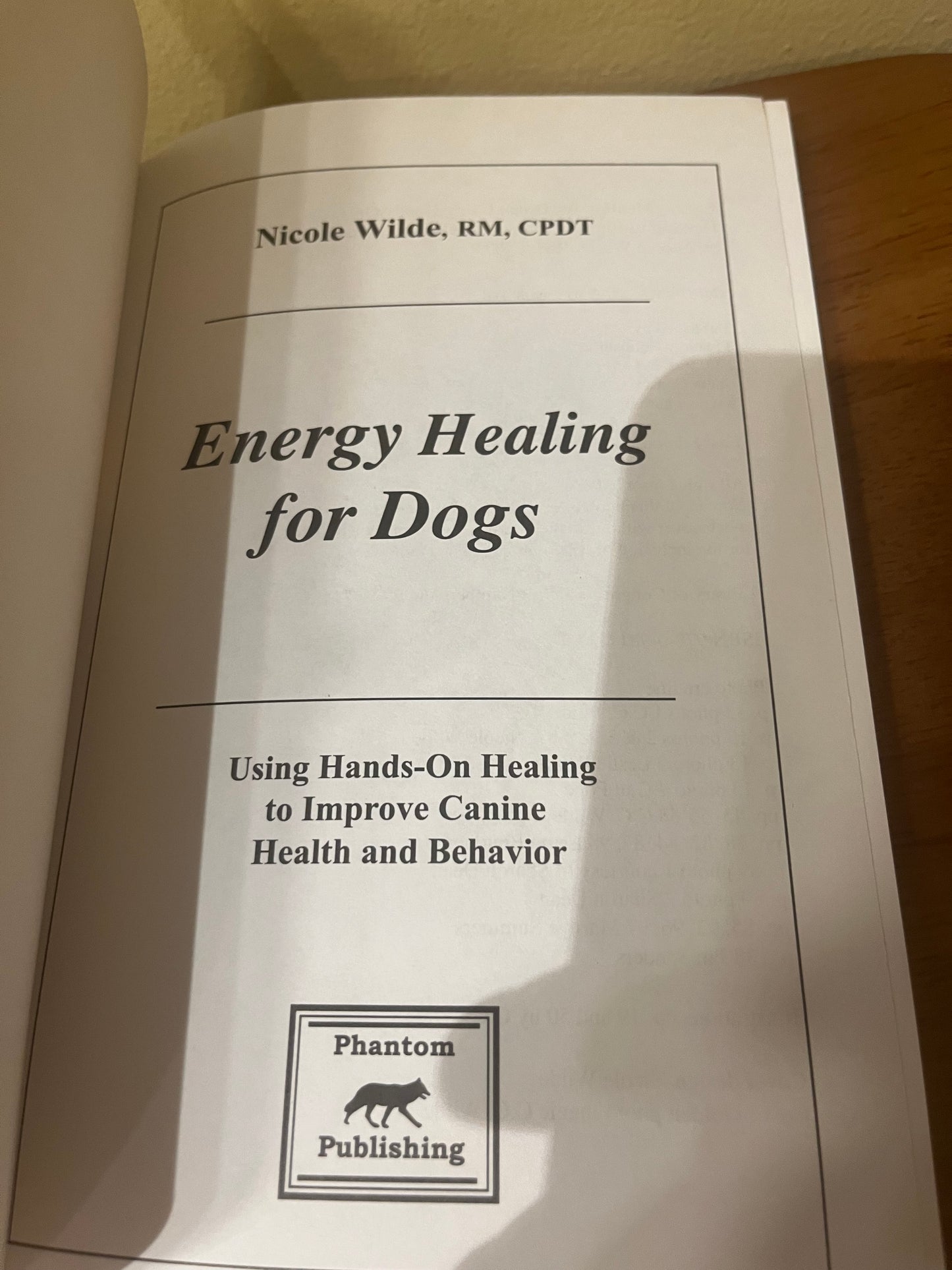 Energy Healing For Dogs: Using Hands-on Healing to Improve Canine Health and Behavior by Nicole Wilde